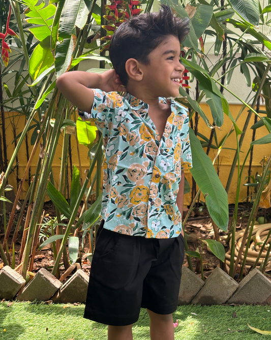 Green Floral Shirt with Black Shorts