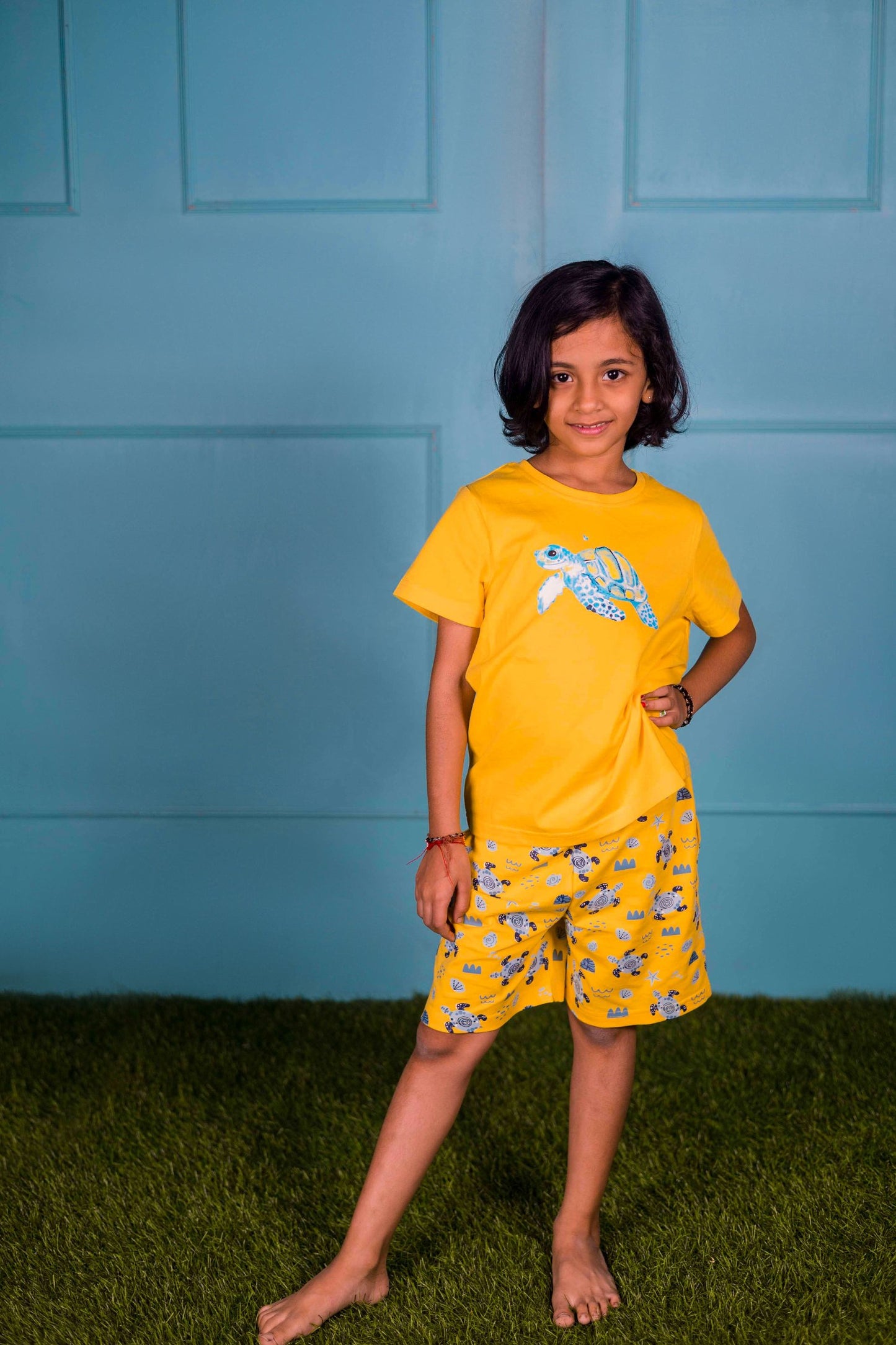 Yellow Turtle Printed T- Shirt with All over print Shorts.